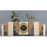 A French Art Deco 3 colour marble clock garniture, the striking mantel clock surmounted by a