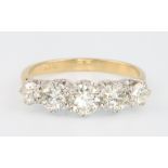 An 18ct yellow gold 5 stone diamond ring approx. 1.5ct size O