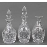2 mallet shaped decanters and stoppers 11" and 12", a mallet shaped decanter 8 1/2" (lacking