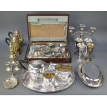 An oval silver plated salver, a canteen of minor cutlery and a quantity of plated ware