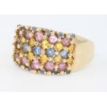 A 9ct yellow gold gem set dress ring size N