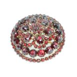 A Victorian garnet target brooch