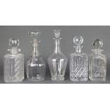 A 19th Century mallet shaped decanter and stopper 10 1/2", 3 square spirit decanters and stoppers