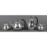 A stylish silver plated Mappin & Webb 4 piece tea and coffee set with ebony mets, designed by Eric