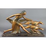 An Art Deco gilt painted plaster figure group of a lady with 2 running Afghan hounds 17"h x 29"w x 6