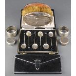 An Art Deco silver mounted leather cigarette holder London 1937, a cased set of 6 silver bean end