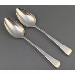 A pair of George III silver table spoons of Old English form Newcastle 1787 114 grams