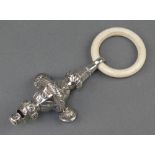 A Victorian repousse silver teether, rattle, whistle
