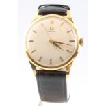 A gentleman's 9ct yellow gold Omega wristwatch on a leather strap