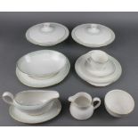 A Royal Doulton Berkshire pattern tea and dinner service comprising 20 tea cups, 18 saucers, 19