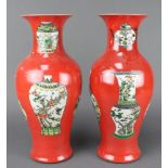 A pair of Chinese 18th century style red ground oviform vases decorated with vases 16 1/2"