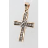 A 9ct yellow gold diamond set cross pendant