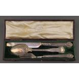 A William IV silver 3 piece christening set comprising knife, fork and spoon in a fitted case,