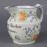 A 19th Century creamware jug decorated with stylised flowers and inscribed George Barlow Silkstone 5