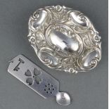 A Victorian repousse silver bon bon dish Birmingham 1896 12 grams, 3" and a silver Welsh love