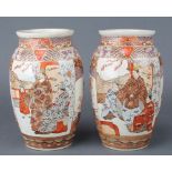 A pair of early 20th Century Satsuma oviform vases with panels of figures in pavilion settings 9 1/