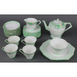 An Art Deco Paragon tea set decorated with spring flowers comprising teapot, 4 tea cups, 10 saucers,