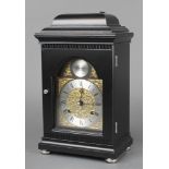 Greenwich Clock Co. a Georgian style striking bracket with 4" arched dial contained in ebonised case