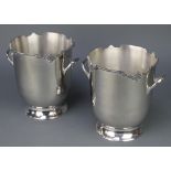 A pair of plated 2 handled wine coolers with floral decoration 10"