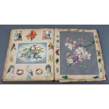 A Victorian scrap book containing memorial cards, Christmas cards, birthday cards etc