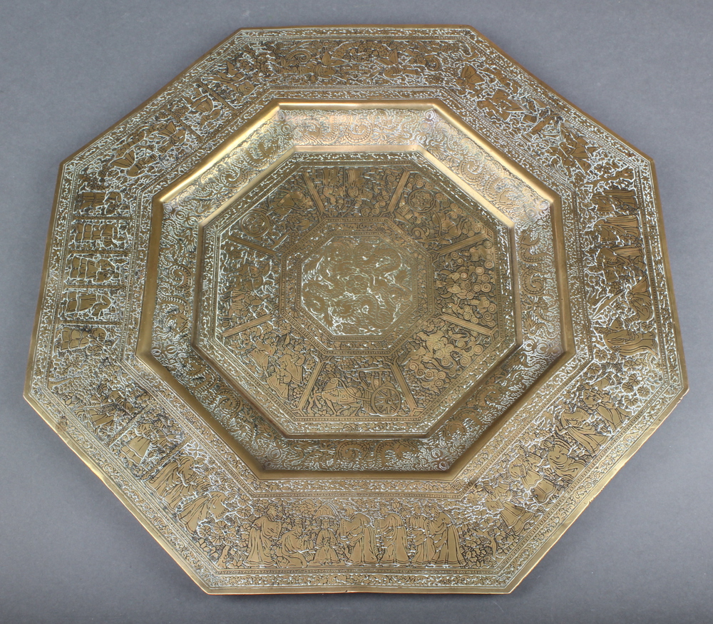 A Kinco octagonal engraved brass dish decorated courtly figures 17"