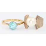 An 18ct yellow gold paste set ring size L and a 14ct gold pearl set ring size I