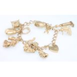 A 9ct yellow gold charm bracelet 35.6 grams