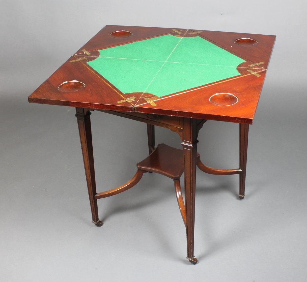 An Edwardian mahogany envelope card table fitted a drawer, raised on square tapering supports with X - Image 2 of 2