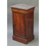 A 19th Century Continental bedside cabinet with black veined marble top fitted a drawer enclosed