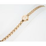 A lady's 9ct yellow gold Accurist wristwatch on a ditto bracelet