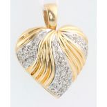 An 18ct yellow gold diamond set heart pendant 5.1 grams