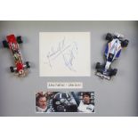 Graham Hill and Damon Hill, a rectangular white paper signed and mounted in a frame inscribed "