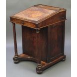 A William IV mahogany Davenport desk with three-quarter gallery, having an inkwell drawer to the