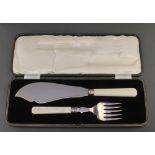 A pair of silver and ivory fish servers Sheffield 1935, cased