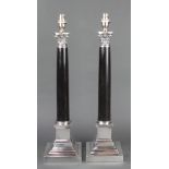 A pair of plated mounted marble Corinthian column table lamps 23"