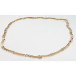 A 9ct yellow gold flat link necklet 18.3 grams