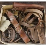 A pair of leather gaiters, a Sam Browne belt, a pair of spurs and a collection of leather straps