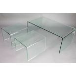 A nest of 3 glass Ghost tables 16 1/2" x 43" x 23 1/2" and 14" x 19 1/2" x 17"