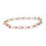 A 9ct yellow gold gem set bracelet