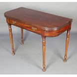 A Georgian mahogany D shaped tea table, fitted a frieze drawer and raised on turned supports 30"h