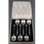 A cased set of 6 silver plated soup spoons