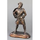 A bronze figure of a standing Scotsman 6 1/2"