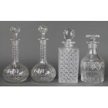 A 19th Century mallet shaped decanter and stopper 9", a pair of mallet decanters and stoppers 10 1/