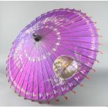 A Bassein parasol with bamboo shaft