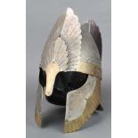A Greek style polished metal and brass helmet 16"