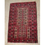 A red and brown ground Belouch prayer rug 59" x 39"