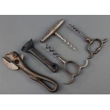 2 19th Century polished steel corkscrews, a silver plated folding picnic corkscrew, a bulls head tin