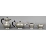 An Art Deco My Lady 4 piece circular planished pewter tea service comprising teapot (dent to