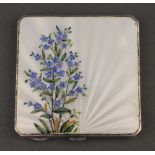 An Art Deco silver and guilloche enamel compact decorated with spring flowers Birmingham 1939