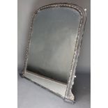 A Victorian arched plate over mantel mirror contained in a grey and gilt painted frame 52"h x 43"w